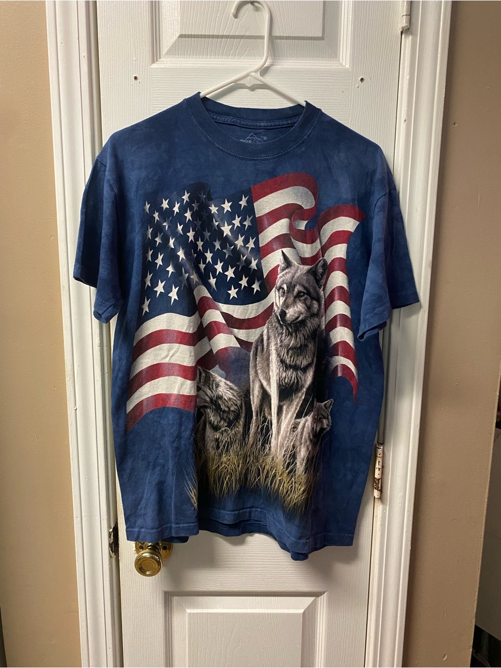 The Mountain Blue T-Shirt with Red & White Flag Graphic